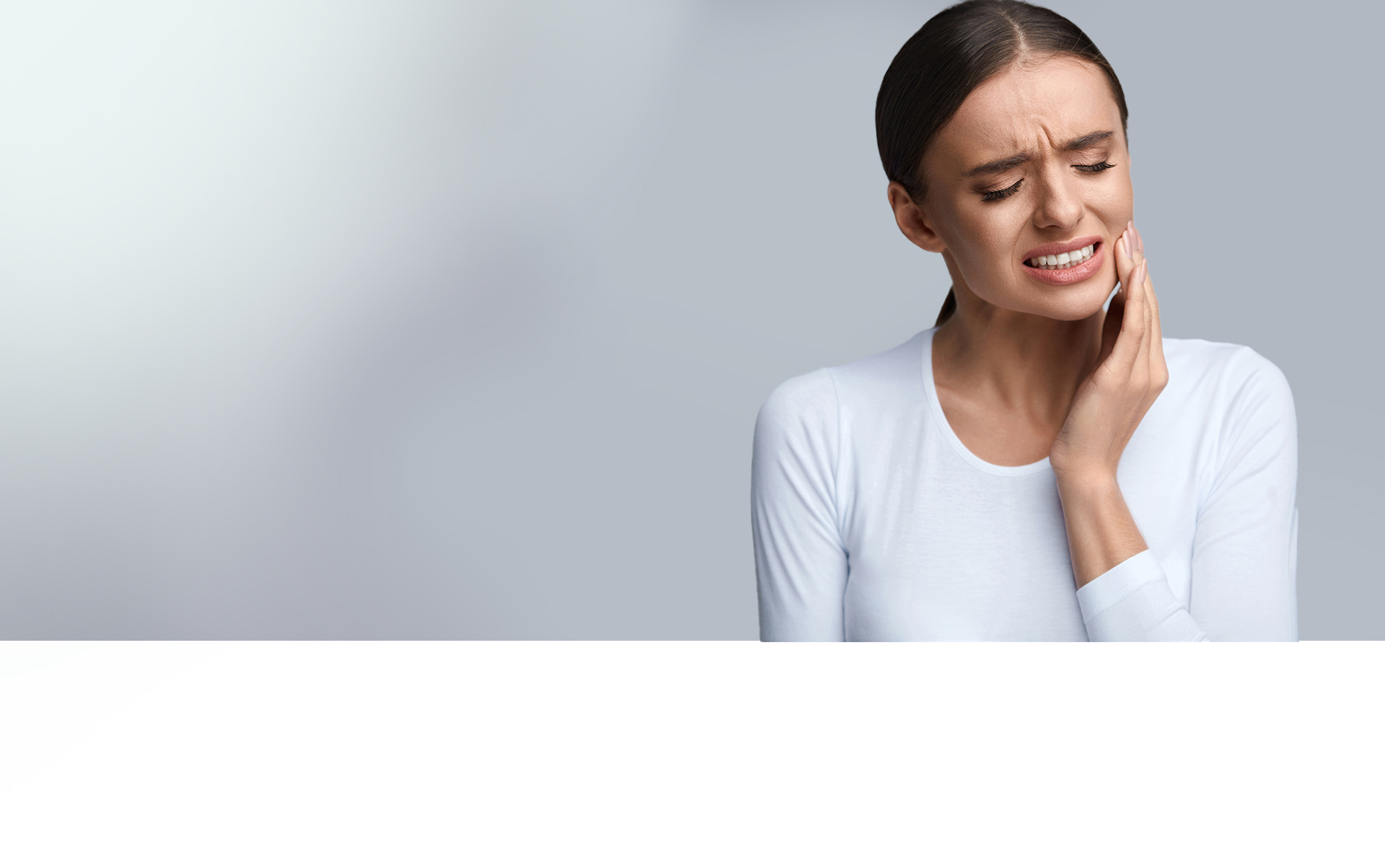 Woman with jaw pain - TMJ